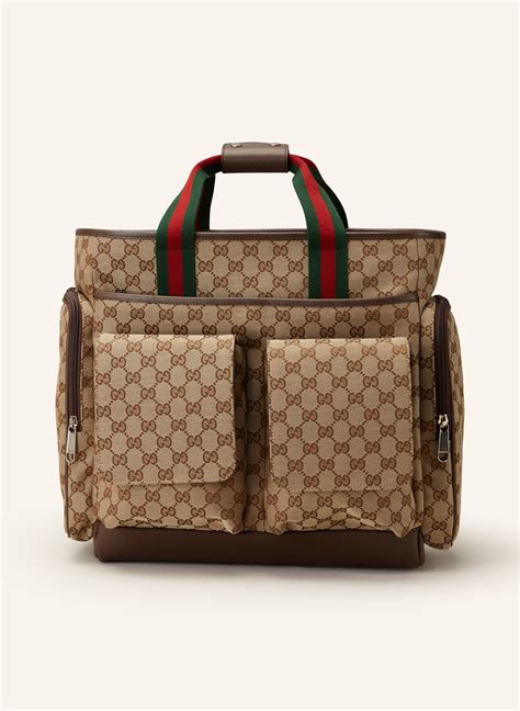 gucci wickeltasche.